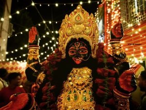 Goddess Kali idol worshipped at a Kolkata pandal on Kali Puja night